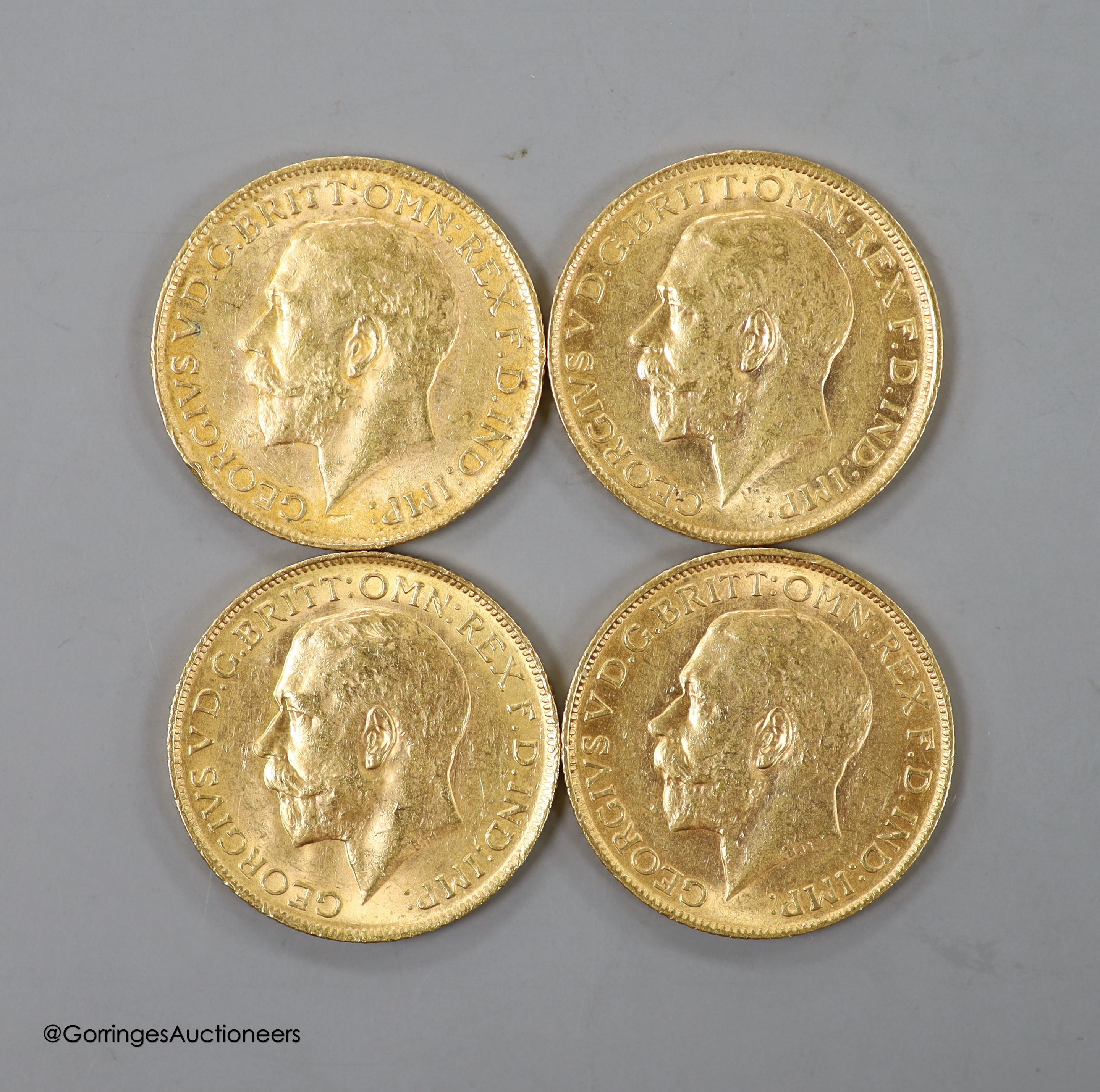 Four George V gold sovereigns, all 1911